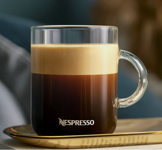 Taza de café Nespresso con espuma