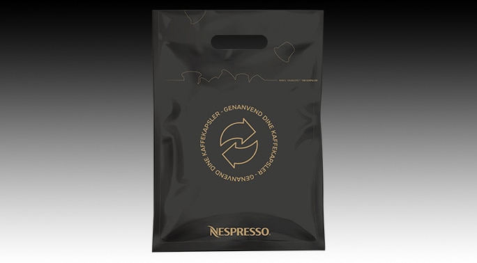 indlæg Peck symbol Nespresso genanvendelsespose til kaffekapsler | Nespresso
