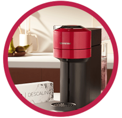 Red and Black Vertuo Coffee Machine with descaling tablets
