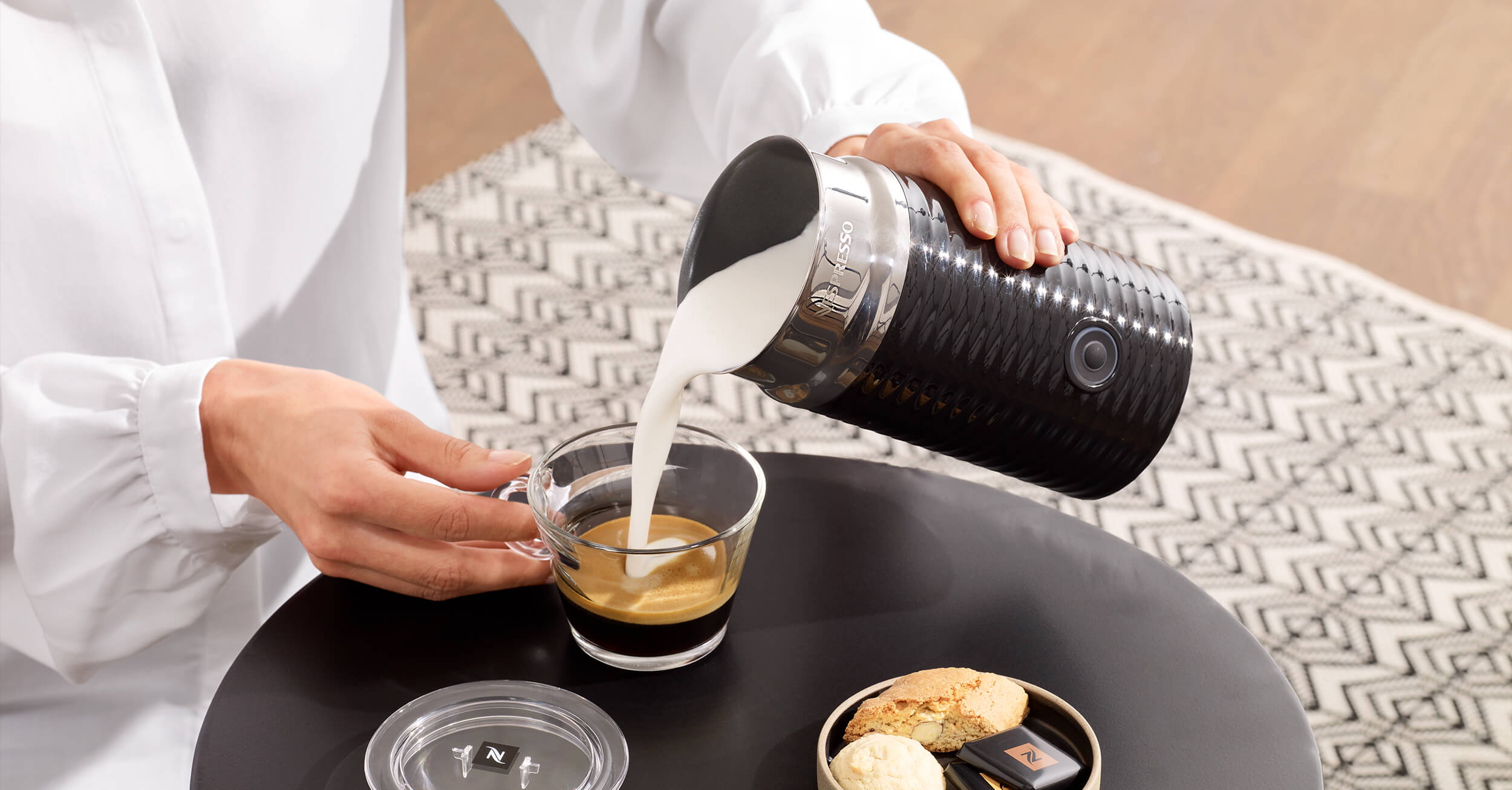 https://www.nespresso.com/ecom/medias/sys_master/public/27292461170718/Header-Milk-Frother-2500x1306.jpg