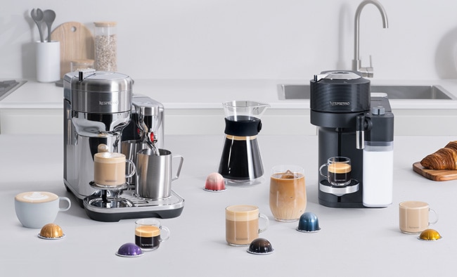 Featuring Vertuo Creatista coffee machine in stainless steel (left) and Vertuo Lattissima coffee machine in black (right)