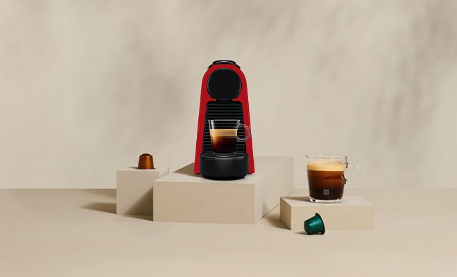 Featuring Essenza Mini coffee machine in red