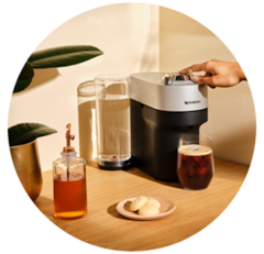 Nespresso VertuoPlus Coffee Machine Ink Black in a red circle logo