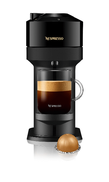 Nespresso machine with a freshly brewed coffee